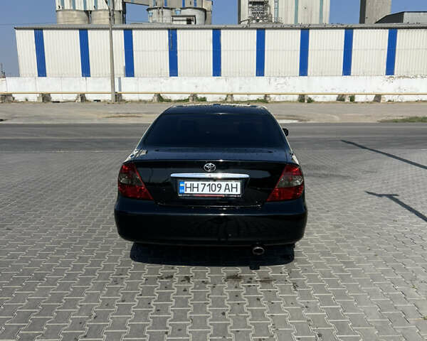 Черный Тойота Камри, объемом двигателя 2.36 л и пробегом 360 тыс. км за 5150 $, фото 1 на Automoto.ua