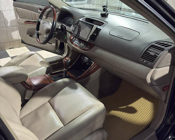 Черный Тойота Камри, объемом двигателя 2.36 л и пробегом 527 тыс. км за 5400 $, фото 12 на Automoto.ua