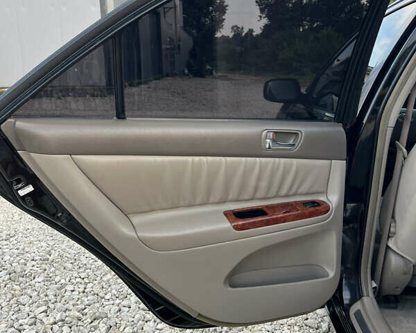 Чорний Тойота Камрі, об'ємом двигуна 2.36 л та пробігом 511 тис. км за 7600 $, фото 22 на Automoto.ua