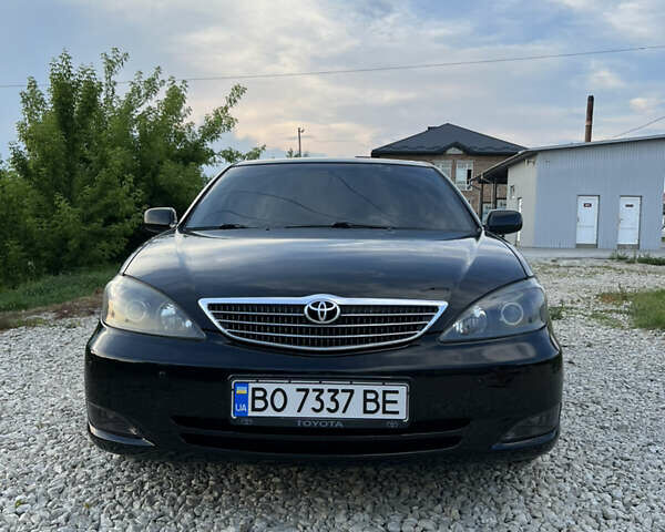 Чорний Тойота Камрі, об'ємом двигуна 2.36 л та пробігом 511 тис. км за 7600 $, фото 4 на Automoto.ua