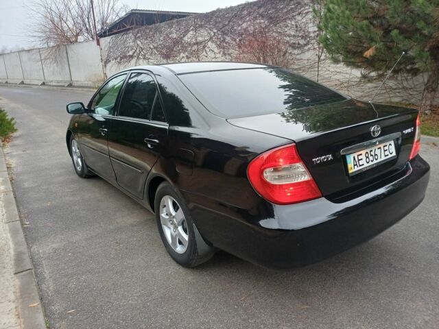 Черный Тойота Камри, объемом двигателя 2.4 л и пробегом 250 тыс. км за 5500 $, фото 7 на Automoto.ua