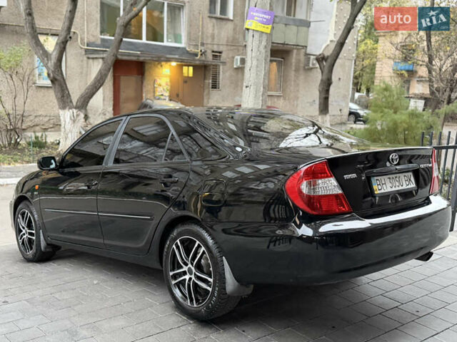 Черный Тойота Камри, объемом двигателя 2.36 л и пробегом 353 тыс. км за 6500 $, фото 10 на Automoto.ua