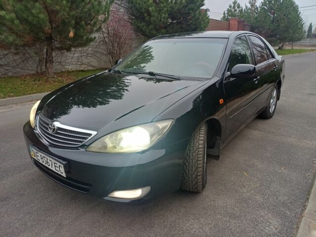 Черный Тойота Камри, объемом двигателя 2.4 л и пробегом 250 тыс. км за 5500 $, фото 4 на Automoto.ua