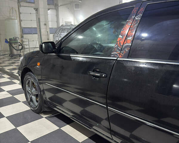 Черный Тойота Камри, объемом двигателя 2.36 л и пробегом 527 тыс. км за 5400 $, фото 4 на Automoto.ua