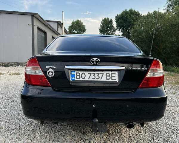 Чорний Тойота Камрі, об'ємом двигуна 2.36 л та пробігом 511 тис. км за 7600 $, фото 9 на Automoto.ua