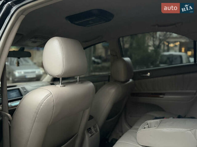 Черный Тойота Камри, объемом двигателя 2.36 л и пробегом 353 тыс. км за 6500 $, фото 21 на Automoto.ua