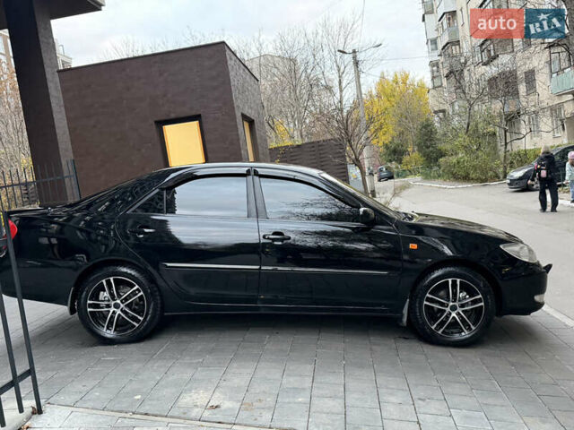 Черный Тойота Камри, объемом двигателя 2.36 л и пробегом 353 тыс. км за 6500 $, фото 15 на Automoto.ua