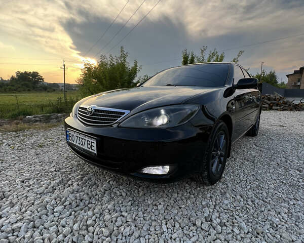 Чорний Тойота Камрі, об'ємом двигуна 2.36 л та пробігом 511 тис. км за 7600 $, фото 17 на Automoto.ua