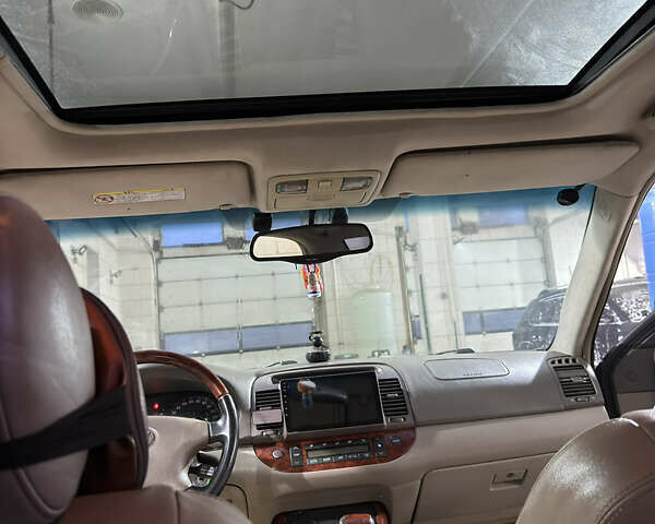 Черный Тойота Камри, объемом двигателя 2.36 л и пробегом 527 тыс. км за 5400 $, фото 24 на Automoto.ua