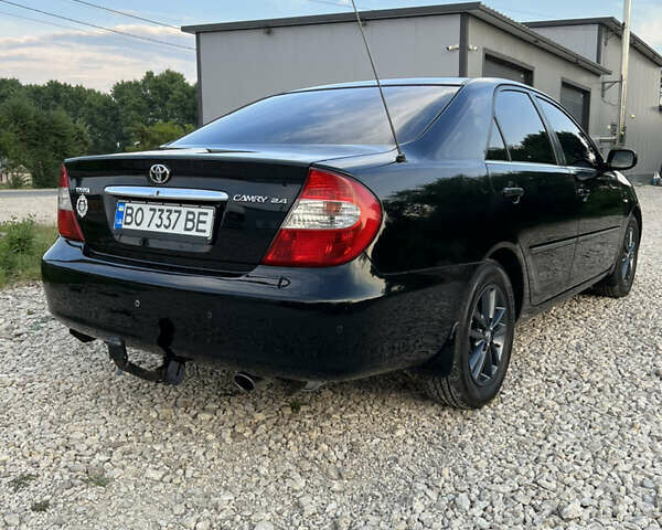 Чорний Тойота Камрі, об'ємом двигуна 2.36 л та пробігом 511 тис. км за 7600 $, фото 10 на Automoto.ua