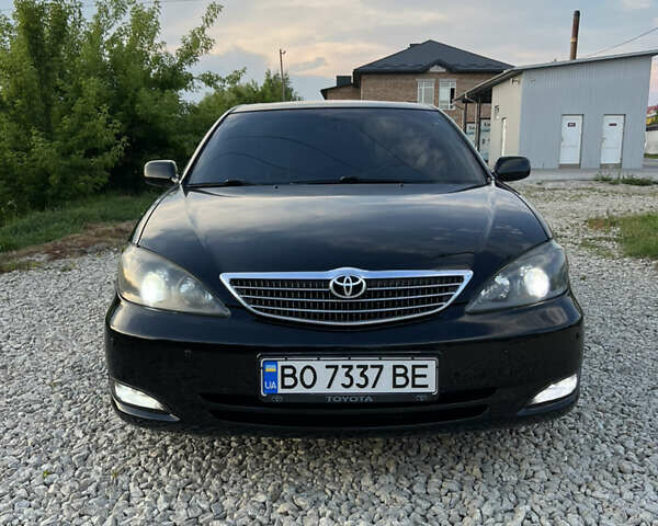 Чорний Тойота Камрі, об'ємом двигуна 2.36 л та пробігом 511 тис. км за 7600 $, фото 16 на Automoto.ua