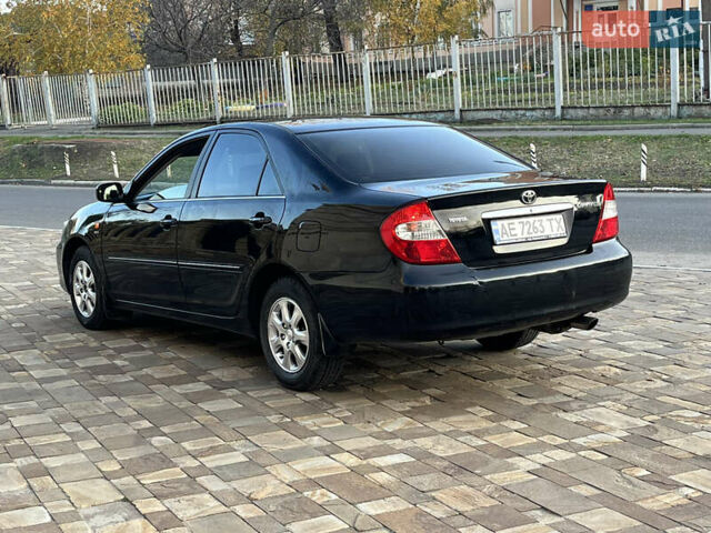 Черный Тойота Камри, объемом двигателя 2.4 л и пробегом 325 тыс. км за 4500 $, фото 6 на Automoto.ua