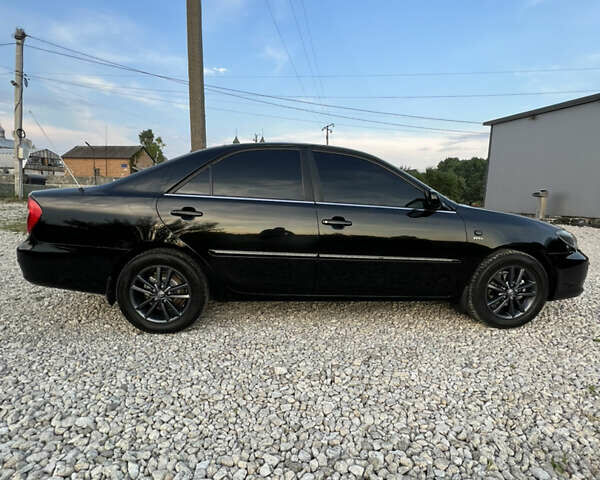 Чорний Тойота Камрі, об'ємом двигуна 2.36 л та пробігом 511 тис. км за 7600 $, фото 14 на Automoto.ua