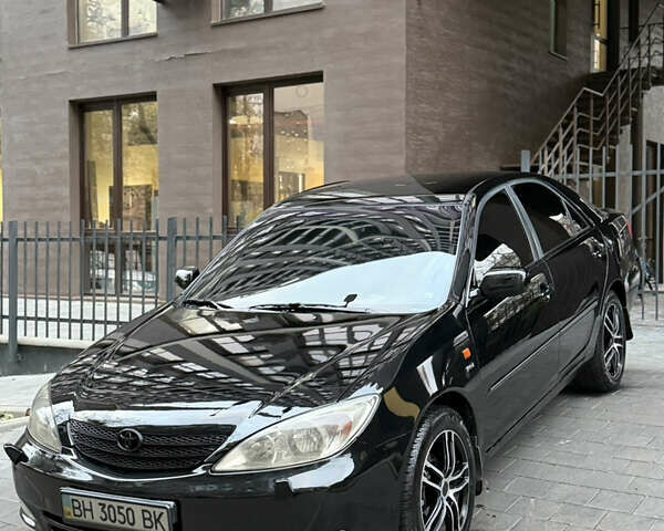 Черный Тойота Камри, объемом двигателя 2.36 л и пробегом 353 тыс. км за 6500 $, фото 4 на Automoto.ua