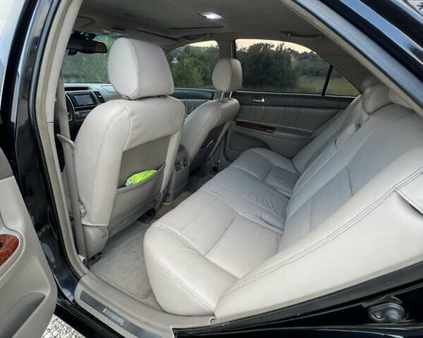 Чорний Тойота Камрі, об'ємом двигуна 2.36 л та пробігом 511 тис. км за 7600 $, фото 23 на Automoto.ua