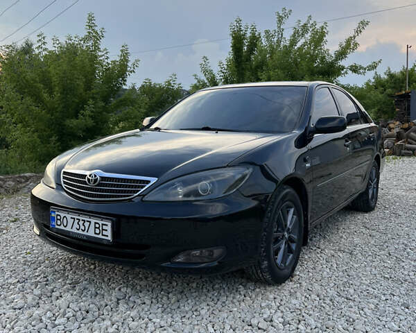 Чорний Тойота Камрі, об'ємом двигуна 2.36 л та пробігом 511 тис. км за 7600 $, фото 2 на Automoto.ua