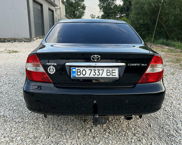 Чорний Тойота Камрі, об'ємом двигуна 2.36 л та пробігом 511 тис. км за 7600 $, фото 8 на Automoto.ua