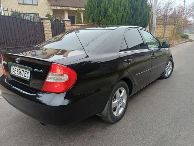 Черный Тойота Камри, объемом двигателя 2.4 л и пробегом 250 тыс. км за 5500 $, фото 5 на Automoto.ua