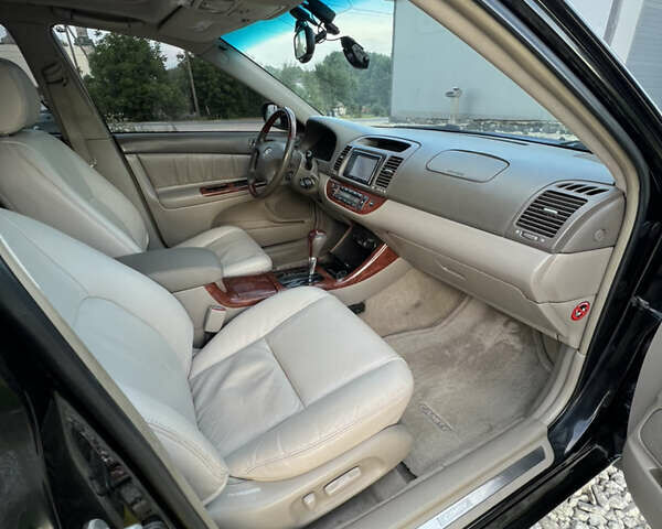 Чорний Тойота Камрі, об'ємом двигуна 2.36 л та пробігом 511 тис. км за 7600 $, фото 30 на Automoto.ua