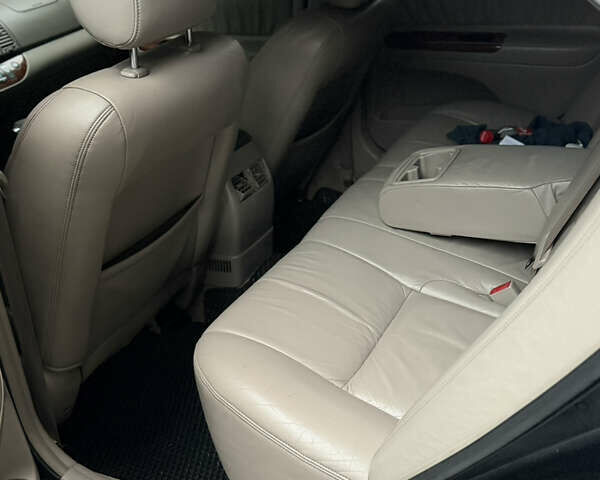 Черный Тойота Камри, объемом двигателя 2.36 л и пробегом 353 тыс. км за 6500 $, фото 20 на Automoto.ua