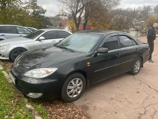 Чорний Тойота Камрі, об'ємом двигуна 2.4 л та пробігом 540 тис. км за 3199 $, фото 1 на Automoto.ua