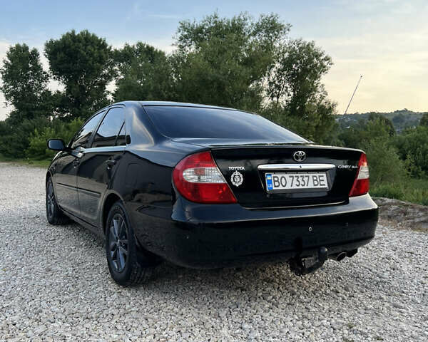 Чорний Тойота Камрі, об'ємом двигуна 2.36 л та пробігом 511 тис. км за 7600 $, фото 6 на Automoto.ua
