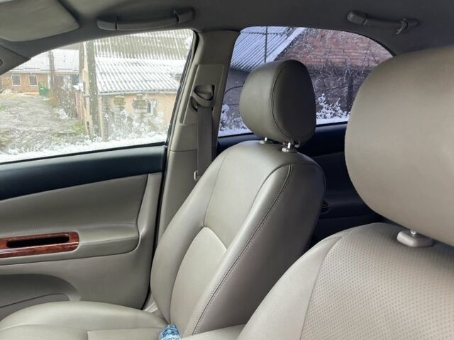 Чорний Тойота Камрі, об'ємом двигуна 2.5 л та пробігом 293 тис. км за 7000 $, фото 1 на Automoto.ua