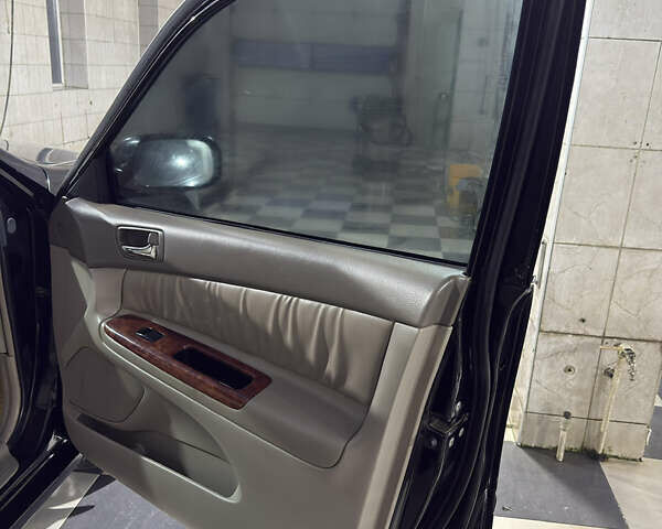 Черный Тойота Камри, объемом двигателя 2.36 л и пробегом 527 тыс. км за 5400 $, фото 13 на Automoto.ua