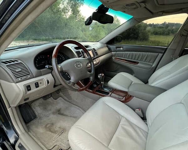 Чорний Тойота Камрі, об'ємом двигуна 2.36 л та пробігом 511 тис. км за 7600 $, фото 26 на Automoto.ua