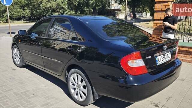 Чорний Тойота Камрі, об'ємом двигуна 2.36 л та пробігом 375 тис. км за 7600 $, фото 7 на Automoto.ua