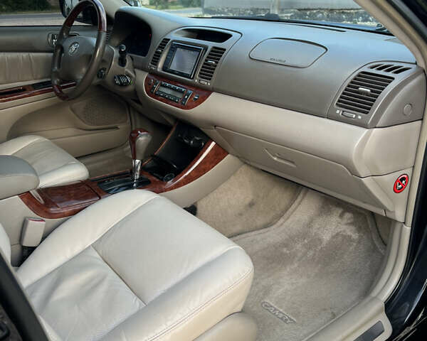 Чорний Тойота Камрі, об'ємом двигуна 2.36 л та пробігом 511 тис. км за 7600 $, фото 31 на Automoto.ua