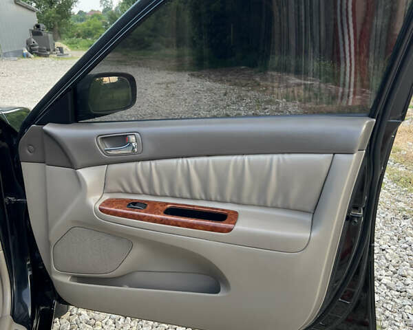 Чорний Тойота Камрі, об'ємом двигуна 2.36 л та пробігом 511 тис. км за 7600 $, фото 32 на Automoto.ua