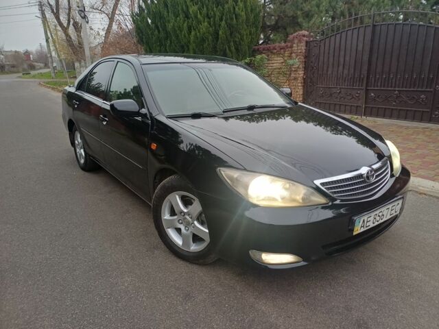 Черный Тойота Камри, объемом двигателя 2.4 л и пробегом 250 тыс. км за 5500 $, фото 3 на Automoto.ua