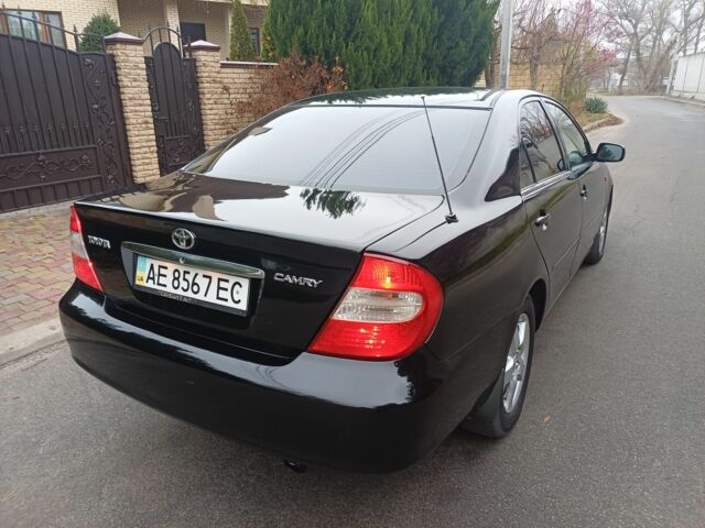 Черный Тойота Камри, объемом двигателя 2.4 л и пробегом 250 тыс. км за 5500 $, фото 6 на Automoto.ua