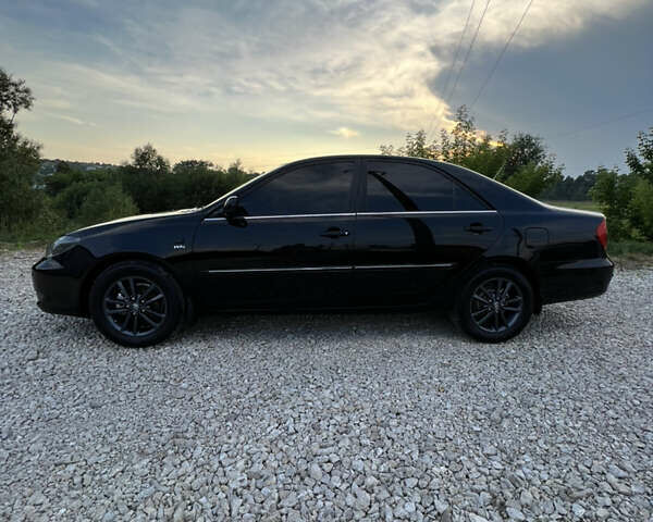 Чорний Тойота Камрі, об'ємом двигуна 2.36 л та пробігом 511 тис. км за 7600 $, фото 5 на Automoto.ua