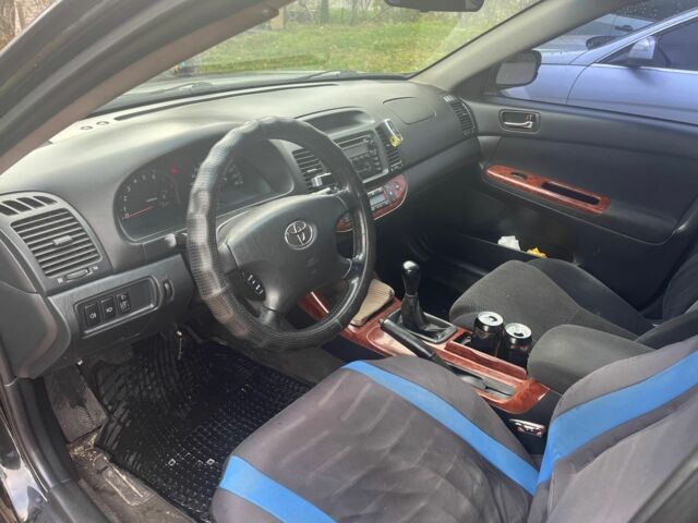 Чорний Тойота Камрі, об'ємом двигуна 2.4 л та пробігом 540 тис. км за 3199 $, фото 5 на Automoto.ua