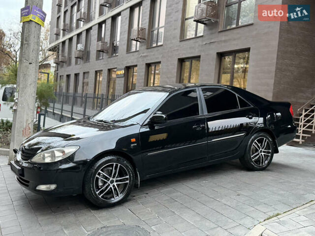 Черный Тойота Камри, объемом двигателя 2.36 л и пробегом 353 тыс. км за 6500 $, фото 6 на Automoto.ua