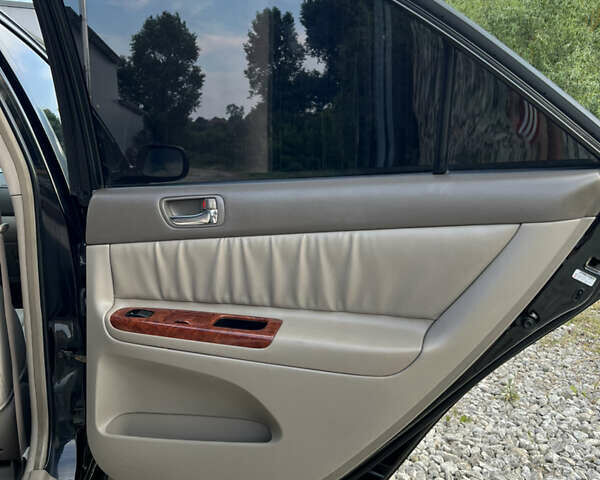 Чорний Тойота Камрі, об'ємом двигуна 2.36 л та пробігом 511 тис. км за 7600 $, фото 38 на Automoto.ua