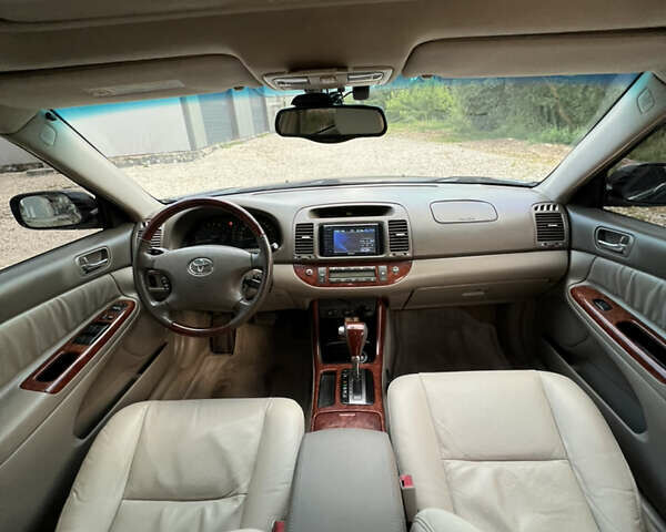 Чорний Тойота Камрі, об'ємом двигуна 2.36 л та пробігом 511 тис. км за 7600 $, фото 34 на Automoto.ua