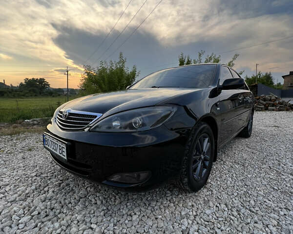 Чорний Тойота Камрі, об'ємом двигуна 2.36 л та пробігом 511 тис. км за 7600 $, фото 1 на Automoto.ua