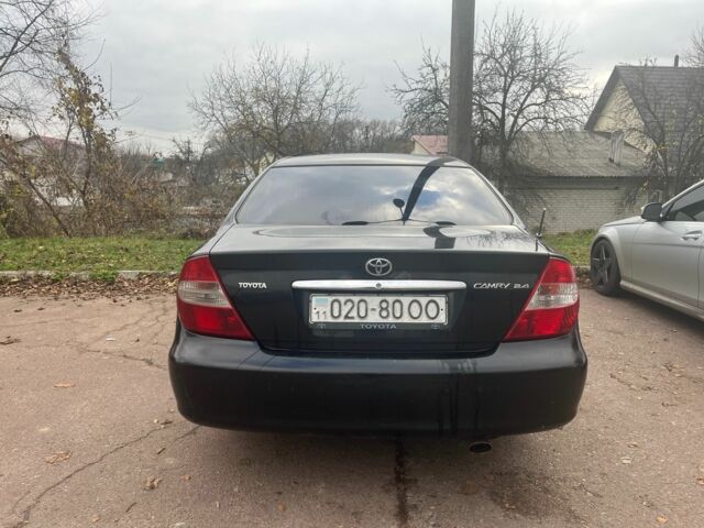 Чорний Тойота Камрі, об'ємом двигуна 2.4 л та пробігом 540 тис. км за 3199 $, фото 3 на Automoto.ua