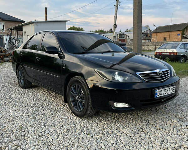 Чорний Тойота Камрі, об'ємом двигуна 2.36 л та пробігом 511 тис. км за 7600 $, фото 15 на Automoto.ua