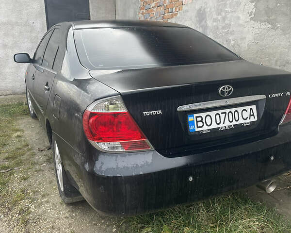 Черный Тойота Камри, объемом двигателя 3 л и пробегом 200 тыс. км за 5800 $, фото 2 на Automoto.ua