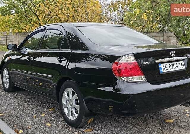 Тойота Камри 2004 в Каменское - Днепродзержинск на Automoto.ua Черный Тойота Камри, объемом двигателя 2 л и пробегом 180 тыс. км за 6700 $, фото 10 на Automoto.ua
