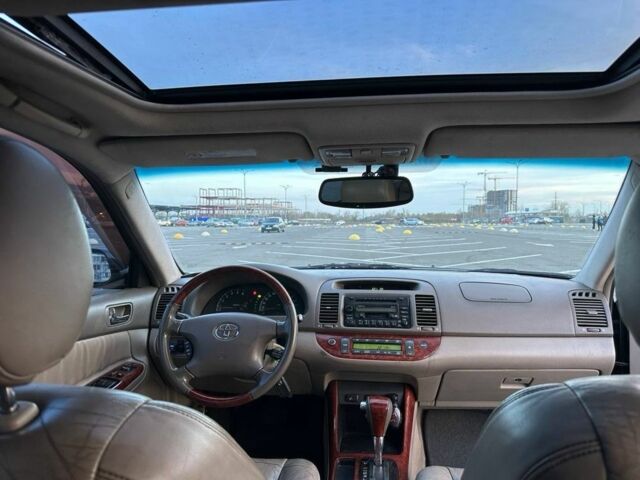 Черный Тойота Камри, объемом двигателя 2.4 л и пробегом 313 тыс. км за 5800 $, фото 11 на Automoto.ua