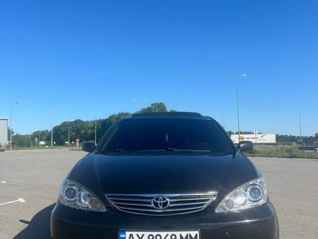 Чорний Тойота Камрі, об'ємом двигуна 2.4 л та пробігом 240 тис. км за 6200 $, фото 15 на Automoto.ua