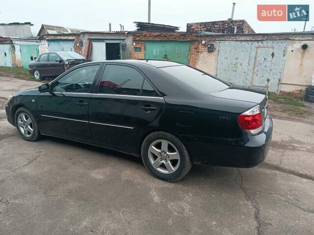 Черный Тойота Камри, объемом двигателя 3 л и пробегом 370 тыс. км за 4500 $, фото 5 на Automoto.ua