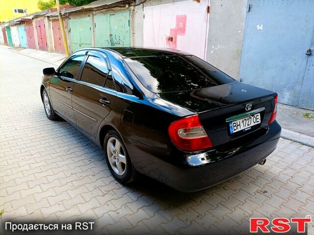 Черный Тойота Камри, объемом двигателя 3 л и пробегом 344 тыс. км за 6300 $, фото 2 на Automoto.ua