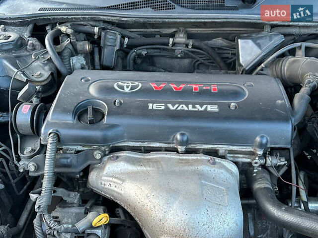 Черный Тойота Камри, объемом двигателя 2.4 л и пробегом 309 тыс. км за 6699 $, фото 17 на Automoto.ua