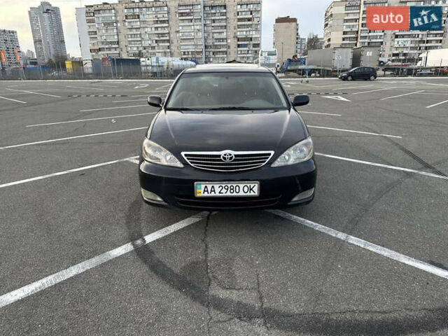 Черный Тойота Камри, объемом двигателя 2.4 л и пробегом 315 тыс. км за 5800 $, фото 8 на Automoto.ua